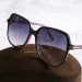 Солнцезащитные очки Tom Ford TF5578-B