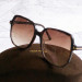 Солнцезащитные очки Tom Ford TF5578-B