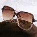 Солнцезащитные очки Tom Ford TF5578-B