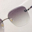 Солнцезащитные очки Cartier CT0147S